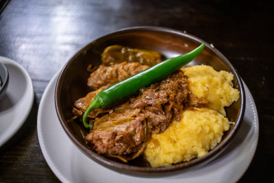 Sarmale (cabbage rolls) with mămăligă (polenta) — Central Europe