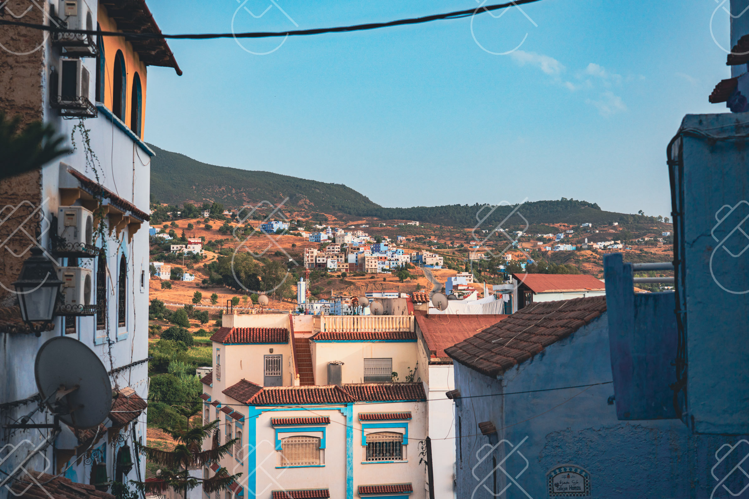 Chefchaouen's rooftops and the Rif mountains, where we stayed from 29 August to 1 September 2022
