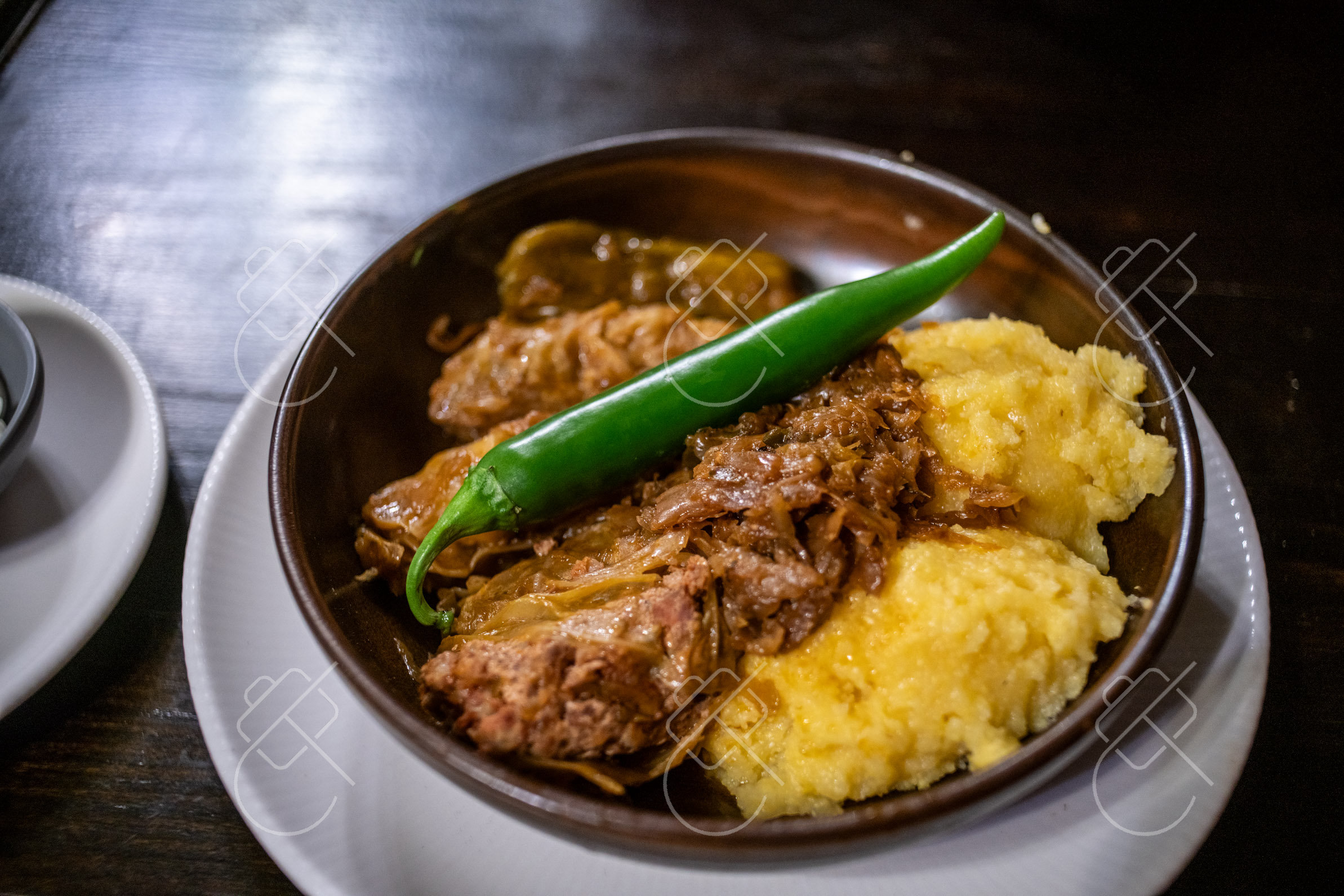View & buy this print Sarmale (cabbage rolls) with mămăligă (polenta) — Central Europe