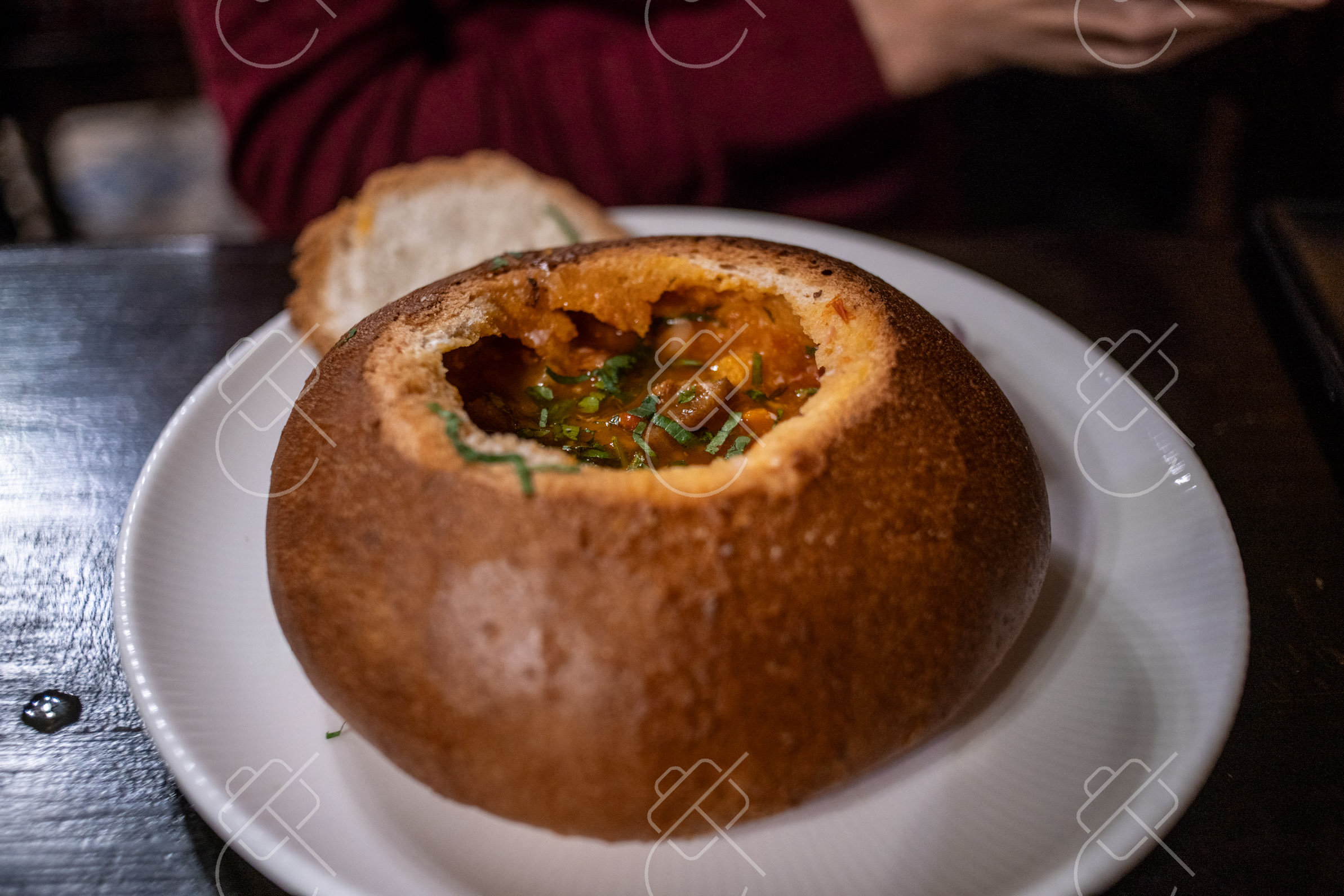 View & buy this print Ciorbă soup served in a bread bowl — Central Europe