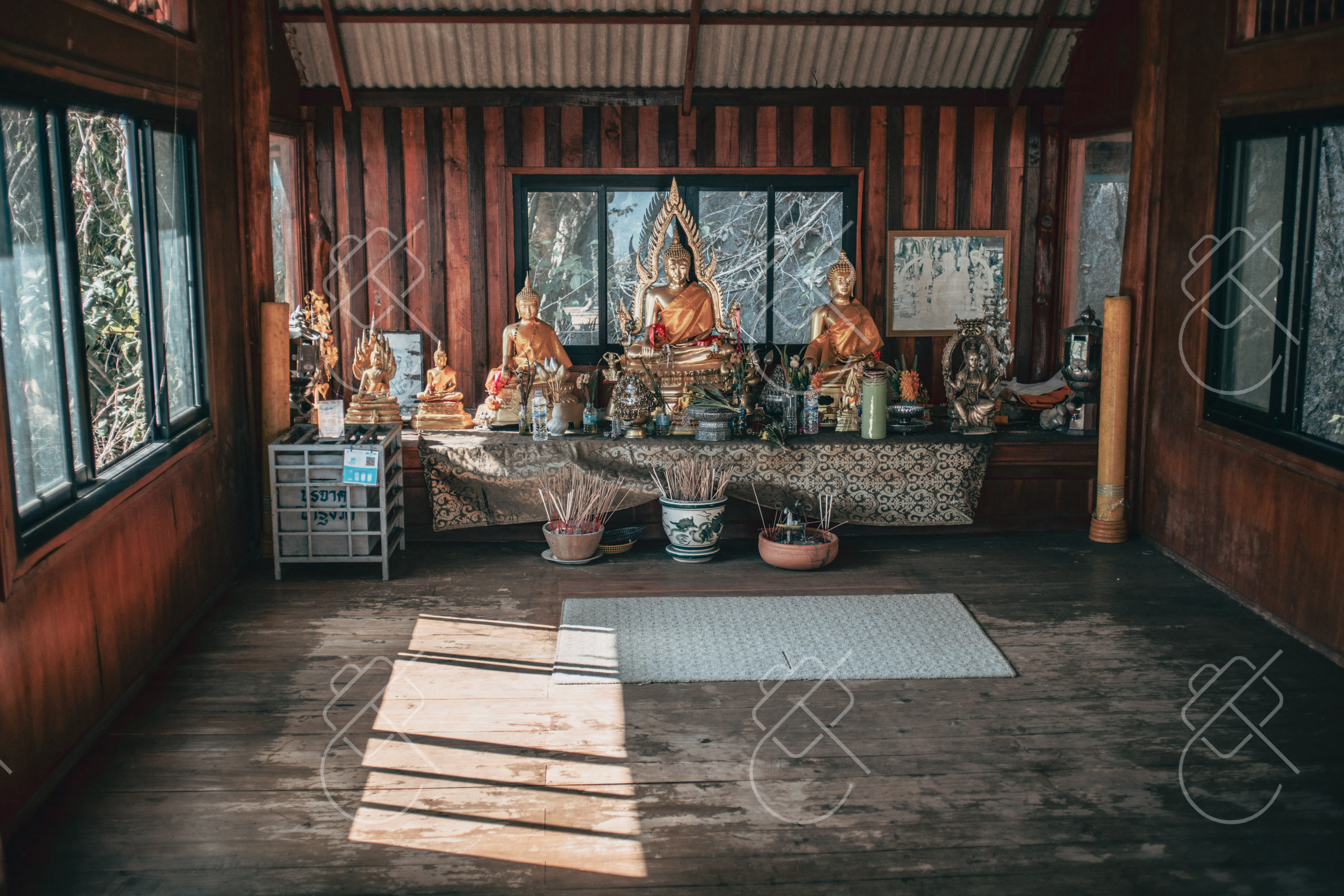 A gilded Lanna temple building at Wat Phra That Lampang Luang — Lampang