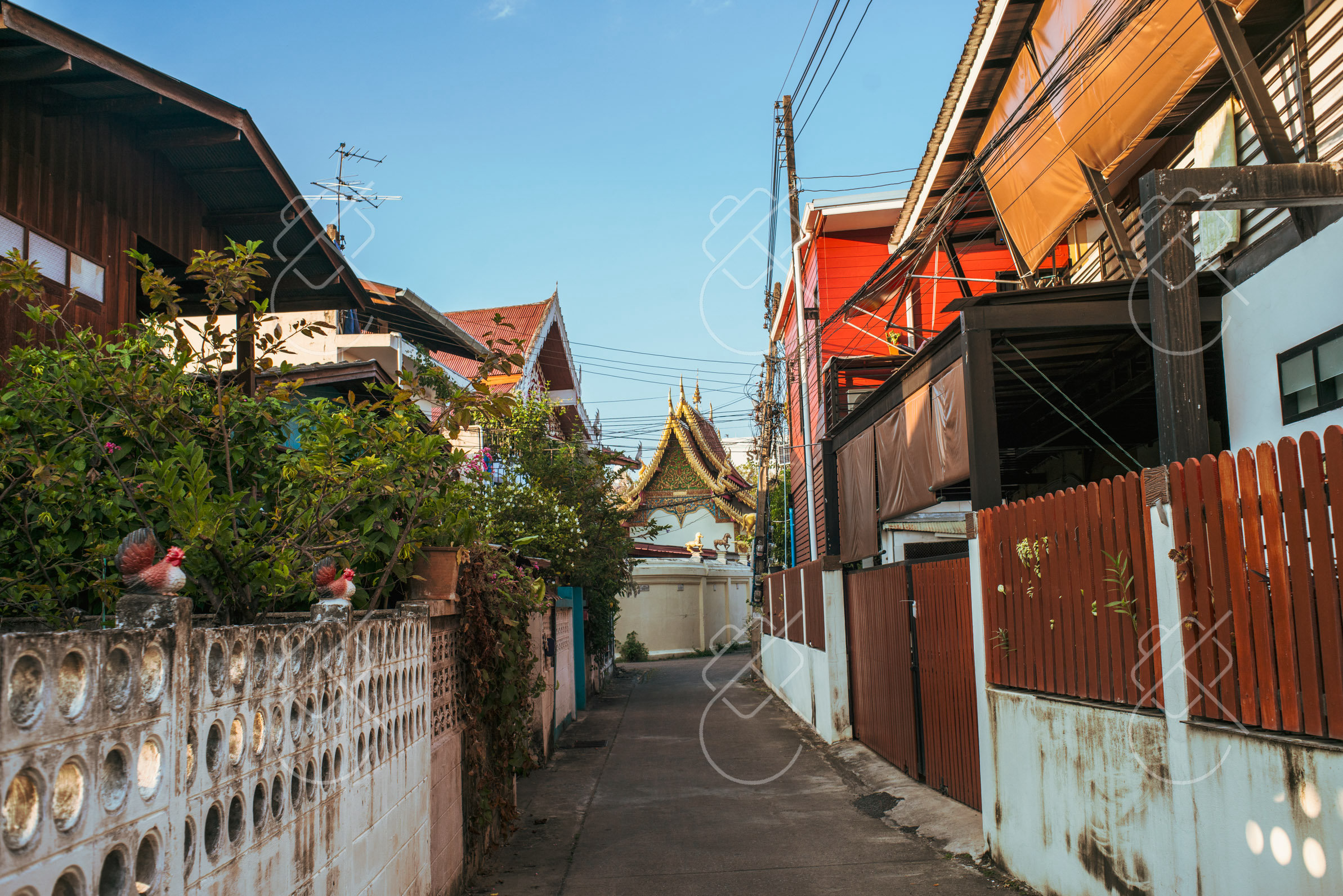 Soaring golden stupa shining against clear northern Thailand skies — Chiang Mai, fine art travel photography print available from Clever Tourists