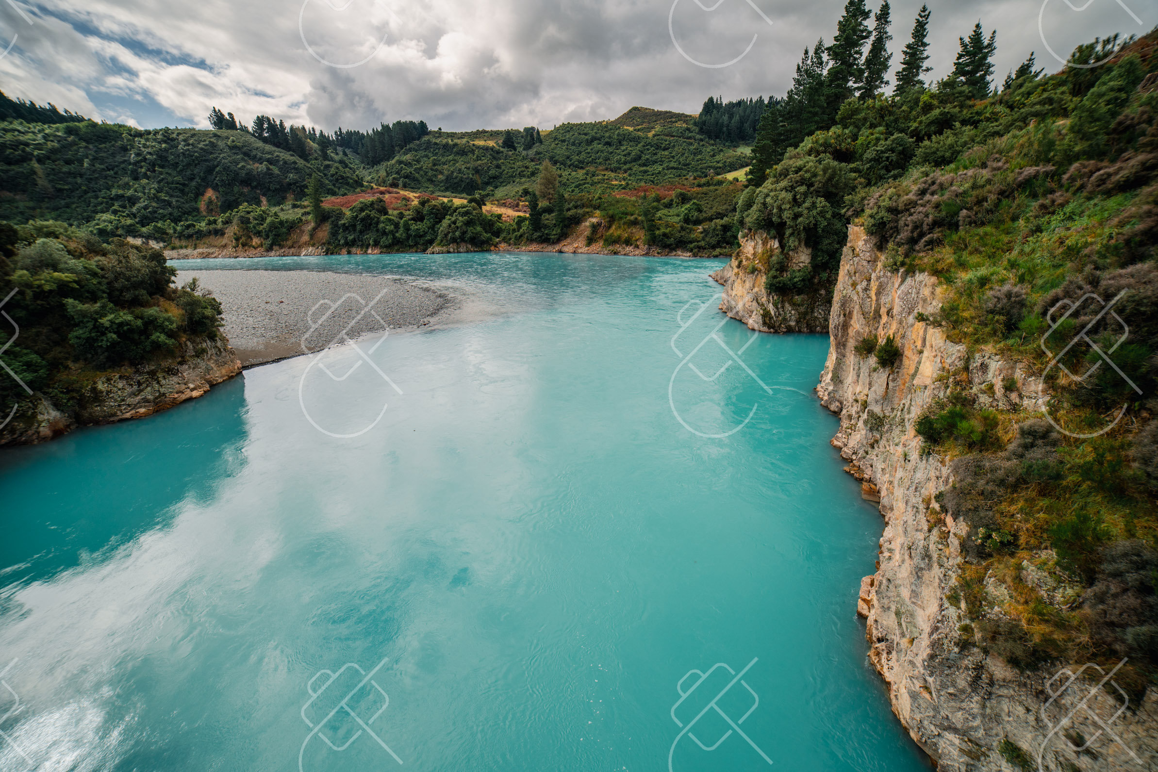 A bend in the gorge where the river widens over the shallows — Rakaia Gorge