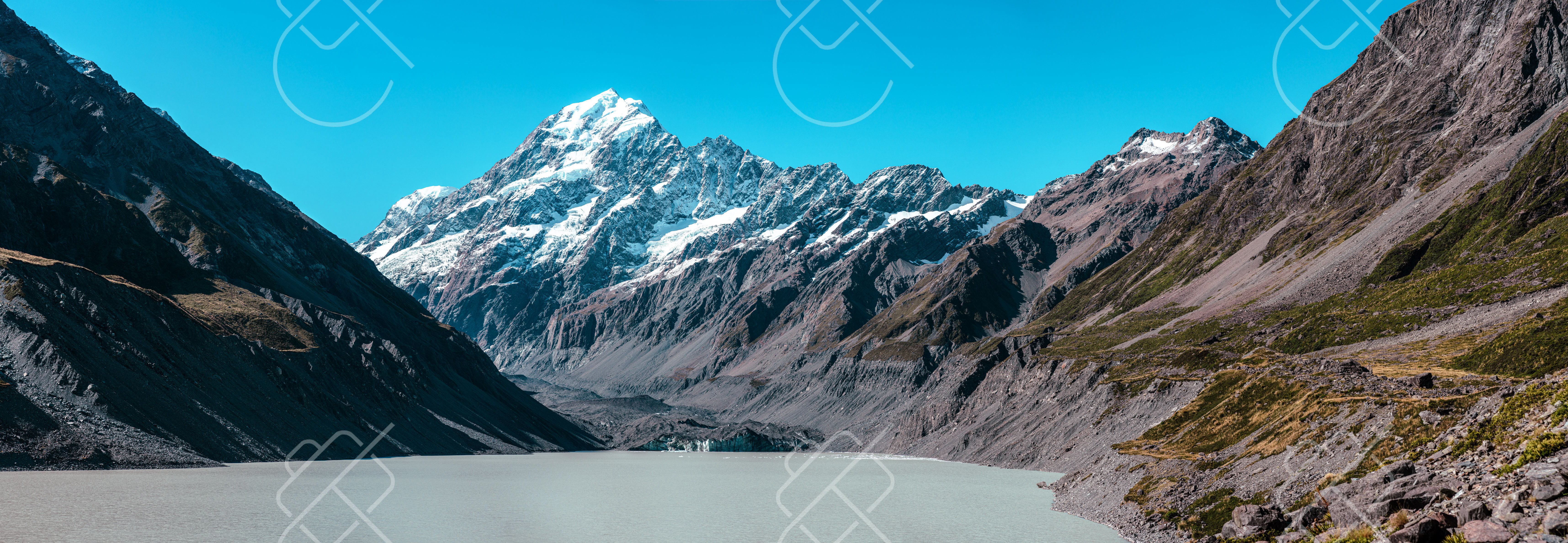 Glacial lake waters meeting the snowfields and hanging glaciers of Mount Cook — Lake Pukaki, fine art travel photography print available from Clever Tourists