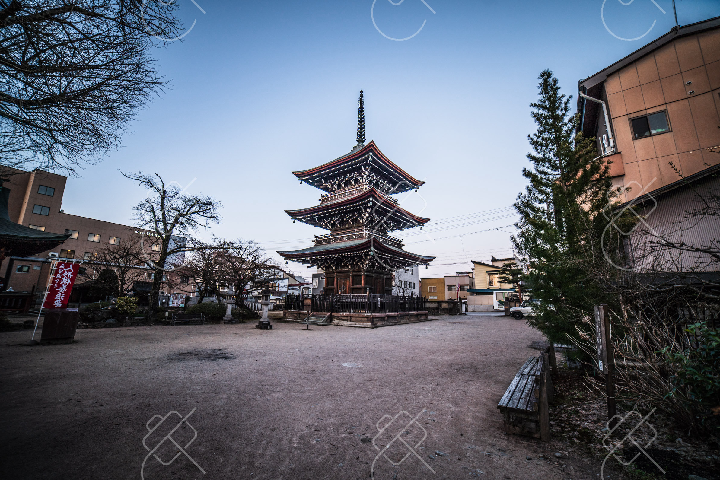 The three-story pagoda of Hida Kokubunji temple at dusk, a few minutes from the station — Takayama, fine art travel photography print available from Clever Tourists