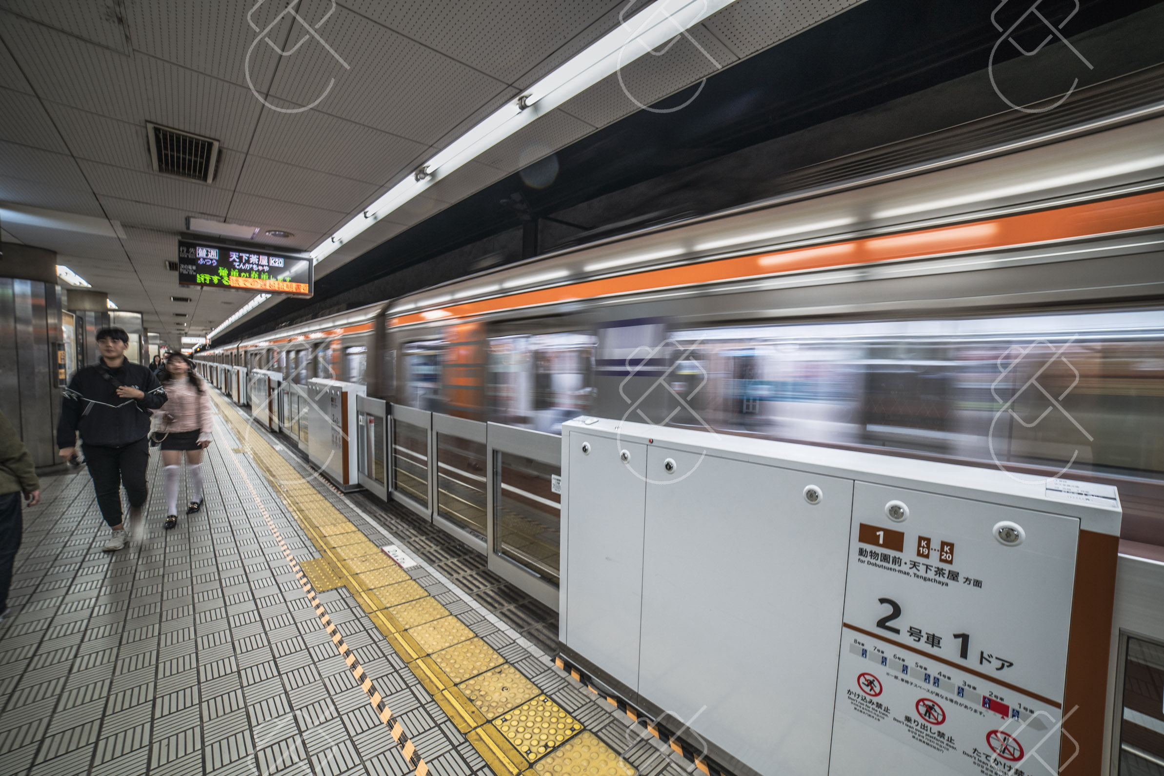 An Osaka Metro platform behind its screen doors; any Suica, PASMO or ICOCA works here, whichever city issued it