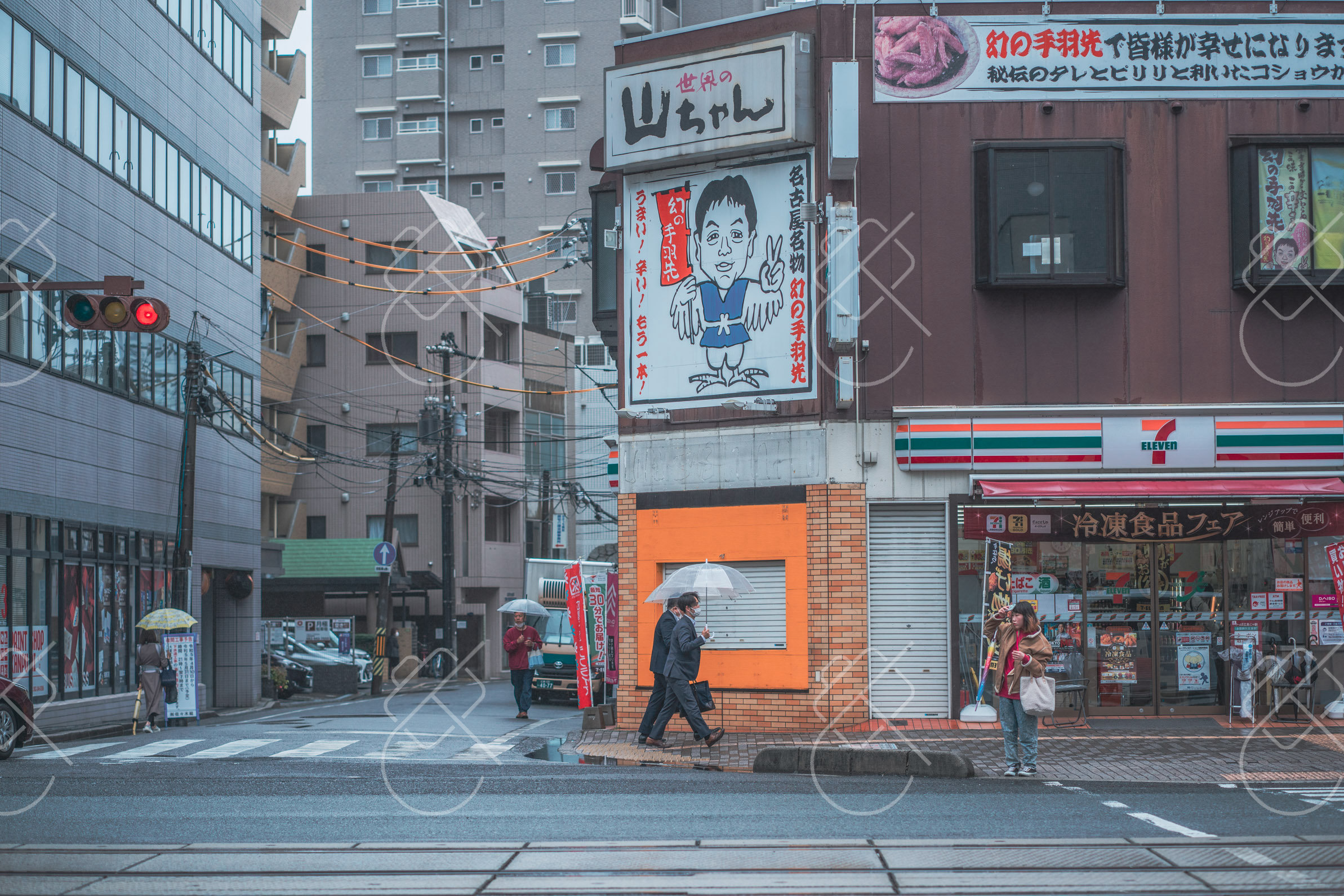 A corner 7-Eleven in Tokyo; convenience stores are the most reliable place to find a sorted bin