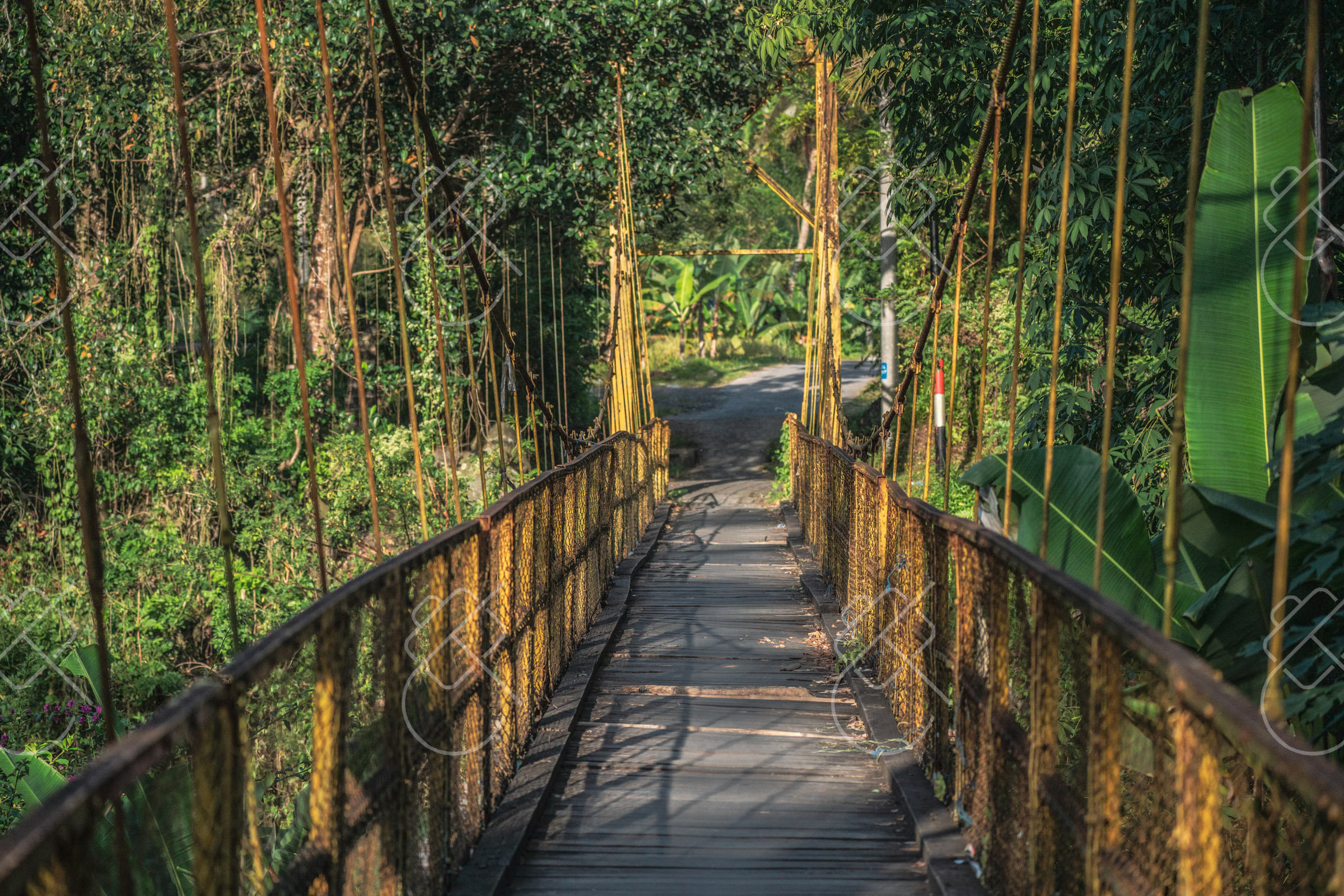 A rusting suspension bridge over the valley — Sidemen, fine art travel photography print available from Clever Tourists