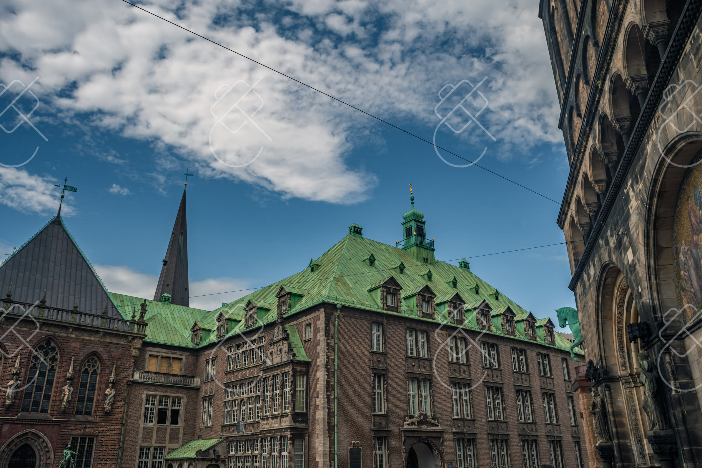 Bremen's Rathaus green copper roof rising beside the twin Dom spires — Bremen, fine art travel photography print available from Clever Tourists