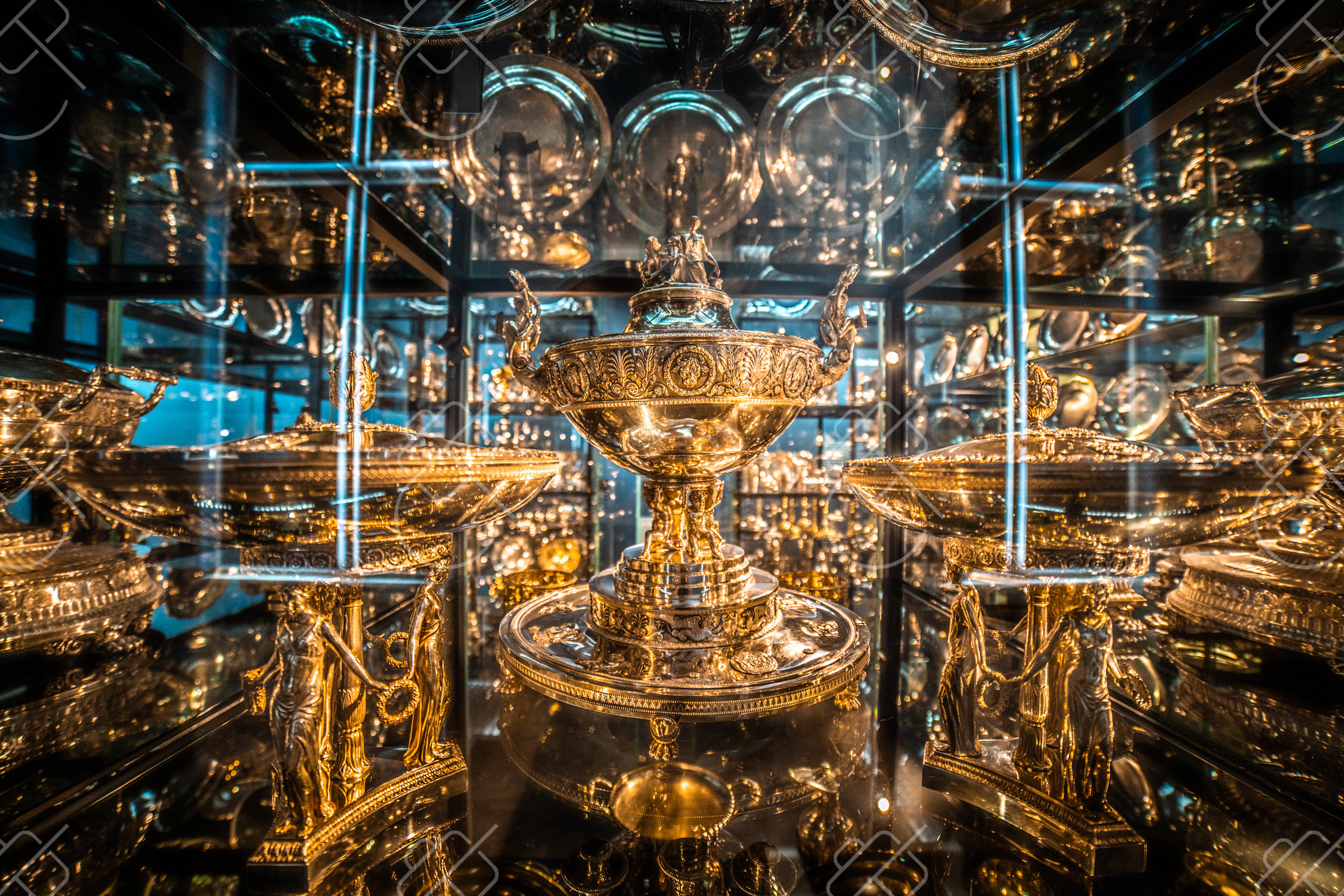 Gilded crowns and vessels on display in the Residenz's Schatzkammer treasury — Munich, fine art travel photography print available from Clever Tourists
