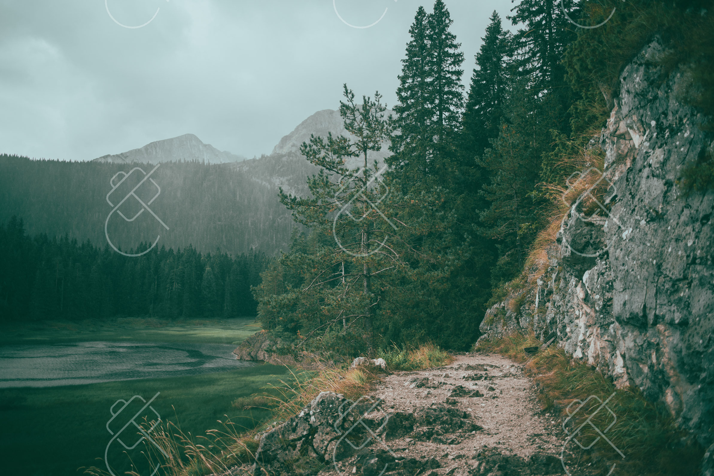 The rocky shoreline path circling Crno Jezero, Black Lake — Zabljak, fine art travel photography print available from Clever Tourists