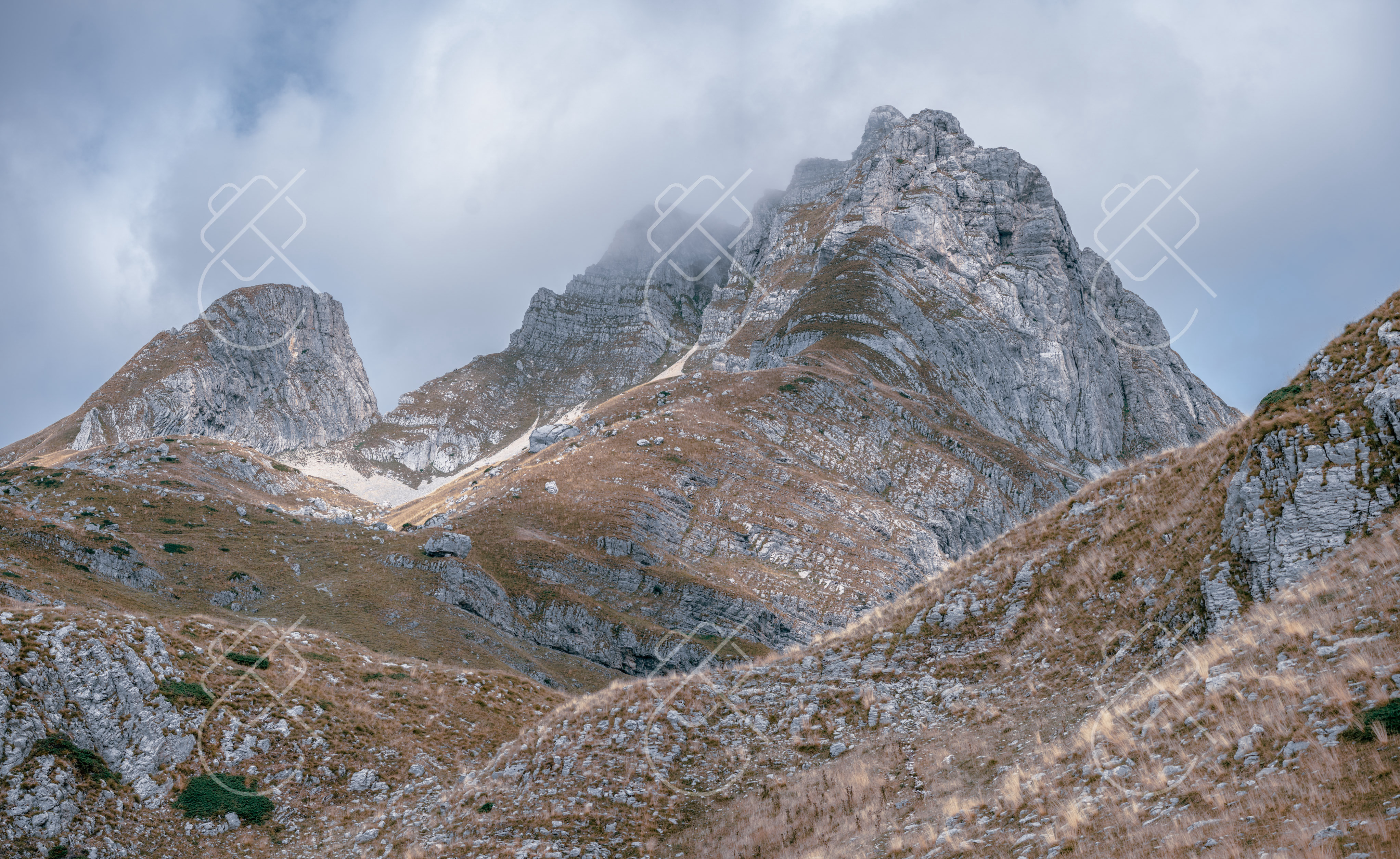 Grey Peaks above Tawny Slopes, photographed in Niksic, Montenegro