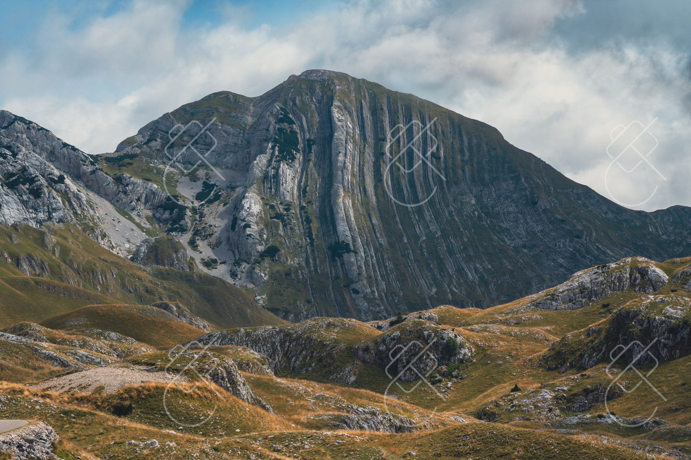 Prutaš, its face scored with near-vertical limestone striations — Nikšić to Piva and the Durmitor Ring, fine art travel photography print available from Clever Tourists