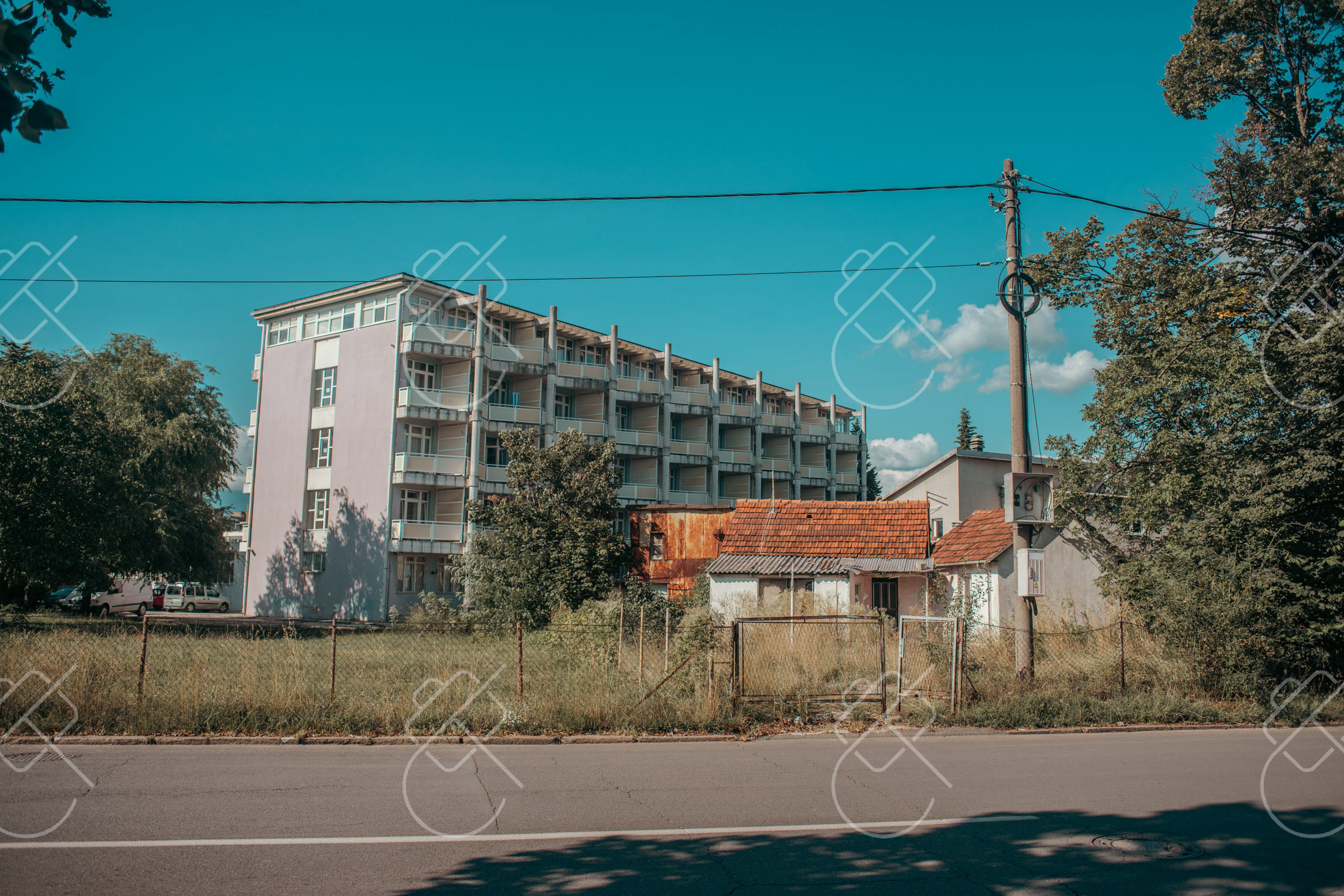 A socialist-era residential block on the edge of the city centre — Central Nikšić, fine art travel photography print available from Clever Tourists