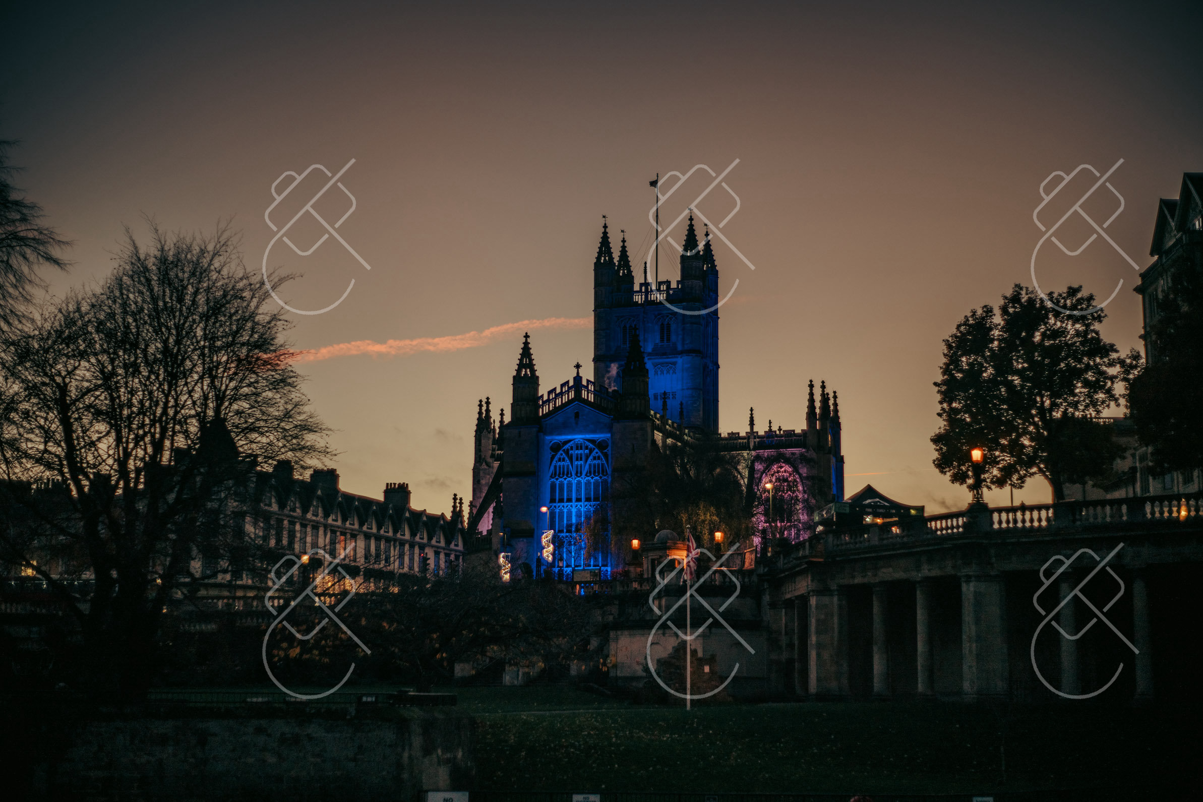 Bath Abbey floodlit blue at dusk above the Abbey Churchyard — Bath, fine art travel photography print available from Clever Tourists