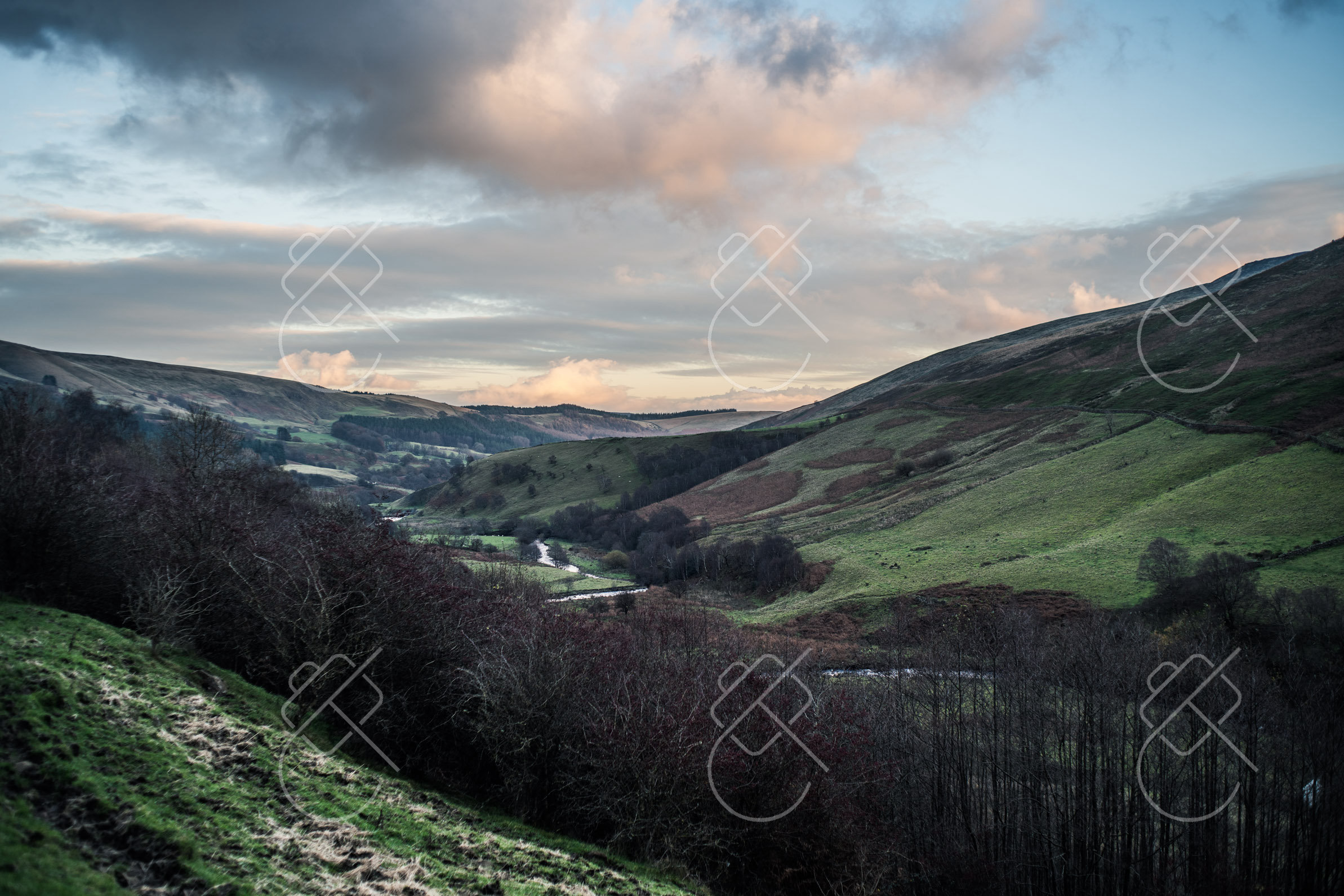 The Hope Valley seen from the hillside above Castleton, low winter light on the fields — Castleton, fine art travel photography print available from Clever Tourists